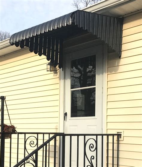 remove metal awning from house|removing old metal awnings.